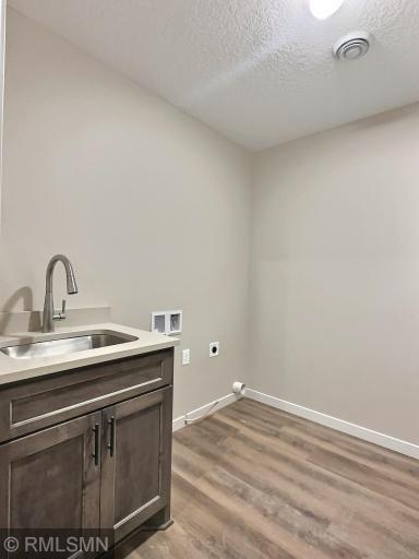 Laundry room will also include a large closet just of the garage door access.