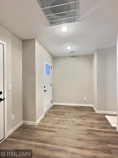 The large front entry is nice for greeting your guests. Access to the garage and laundry room is also located here.