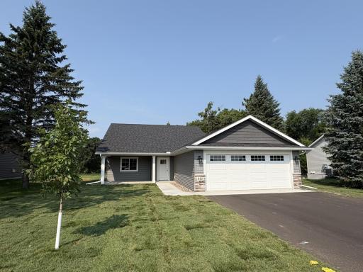 The 2 car attached garage will be insulated and sheet rocked. The asphalt driveway, sprinkler system and sod is completed. Can close quickly.