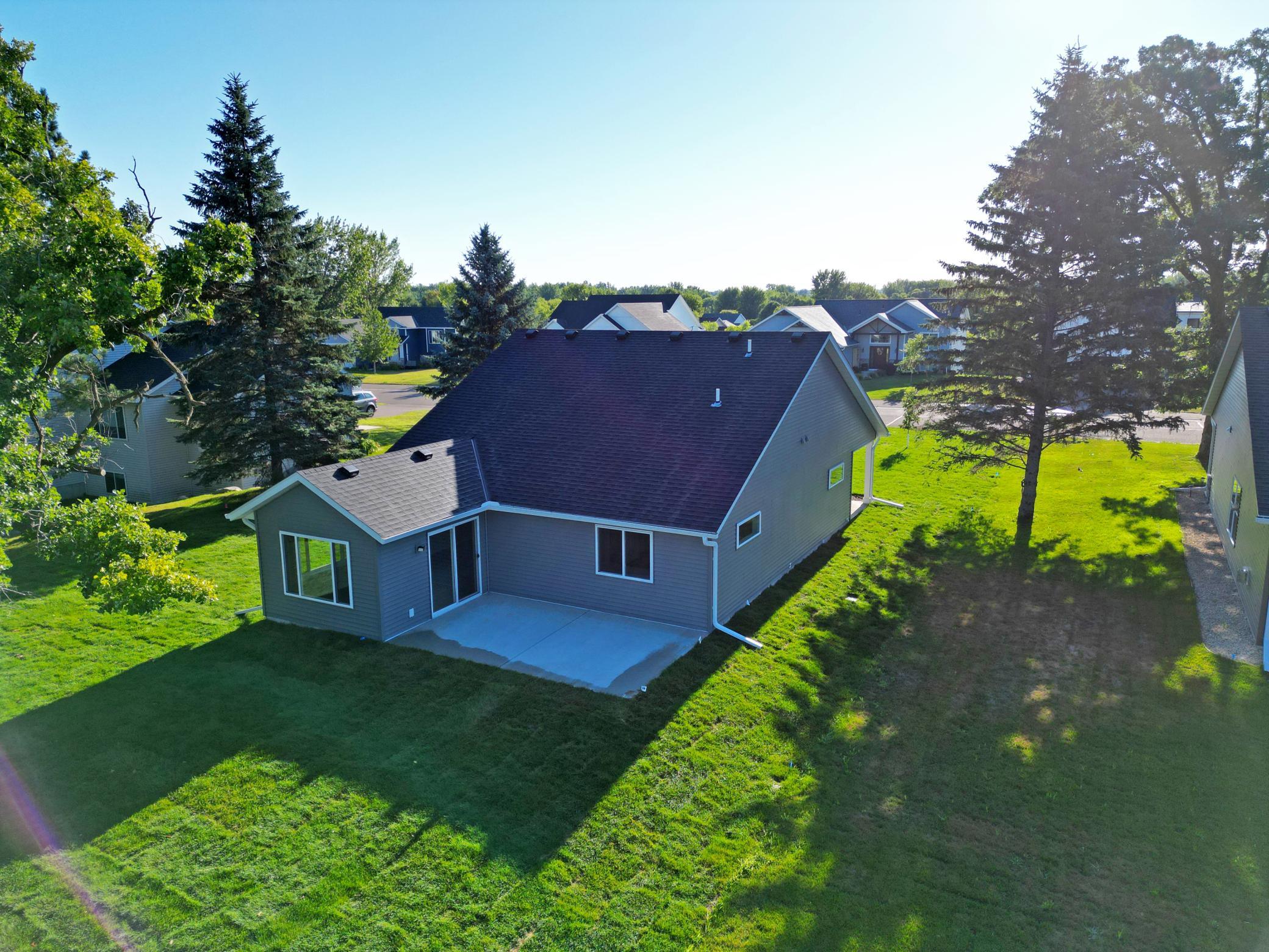 Patio home is all completed and ready for you to enjoy golf course living in the Southbrook golf course community. . The sun room of the back is perfect for viewing the open area that is behind the home.