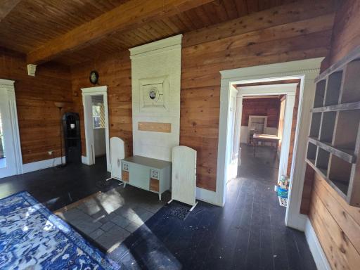 Another view of living room potential for wood stove.