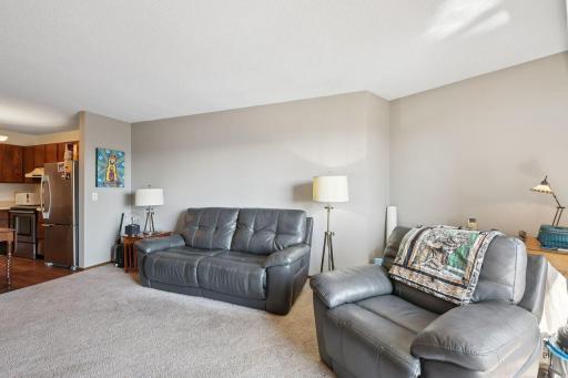 Other angle of great room and kitchen access.