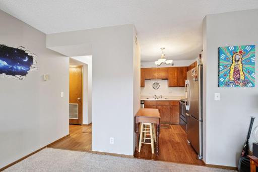 Great room leads to either the kitchen or the main hallway