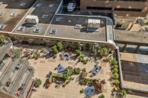 This is the view from the 10th floor balcony down to the rooftop patio on the 3rd floor.