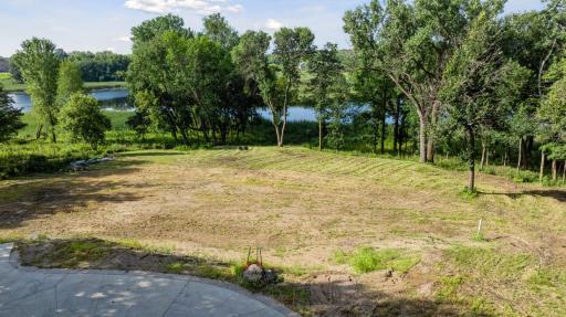 Expansive front yard offers room for a pool, and side yard offers room for a tennis court.