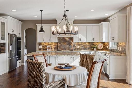 This spacious gourmet kitchen as ample space for both busy mornings and cooking dinner for a crowd.