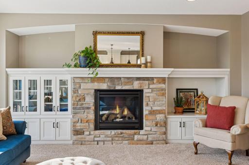 The living room fireplace creates a welcome space for quiet mornings with a cup of coffee or welcoming guests for conversation
