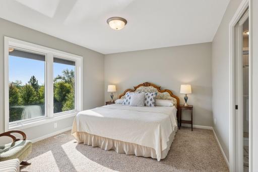 The fourth upper level bedroom with an ensuite bathroom.