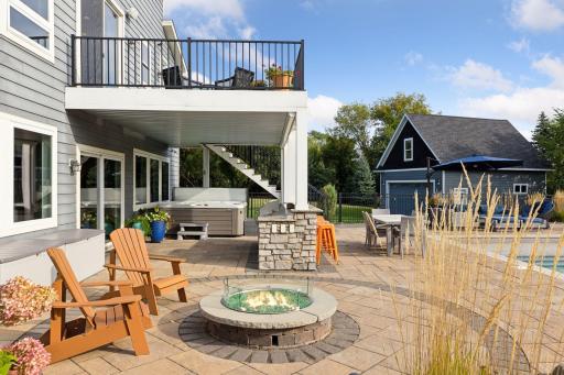 The gas fire pit area is perfectly situated to view both the pool and the night sky!