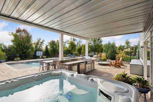 The view of the backyard with from the hot tub.