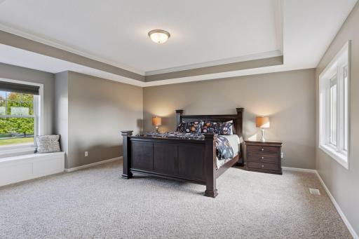 Primary Bedroom with window seat and ensuite bathroom