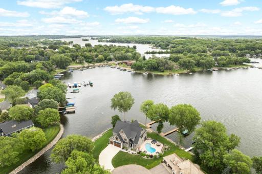 Experience the ultimate Luxury Lakeshore Lakestyle in this one-of-a-kind property, perfectly positioned on a premium peninsula with a front-row seat to some of Prior Lake's most breathtaking scenery.
