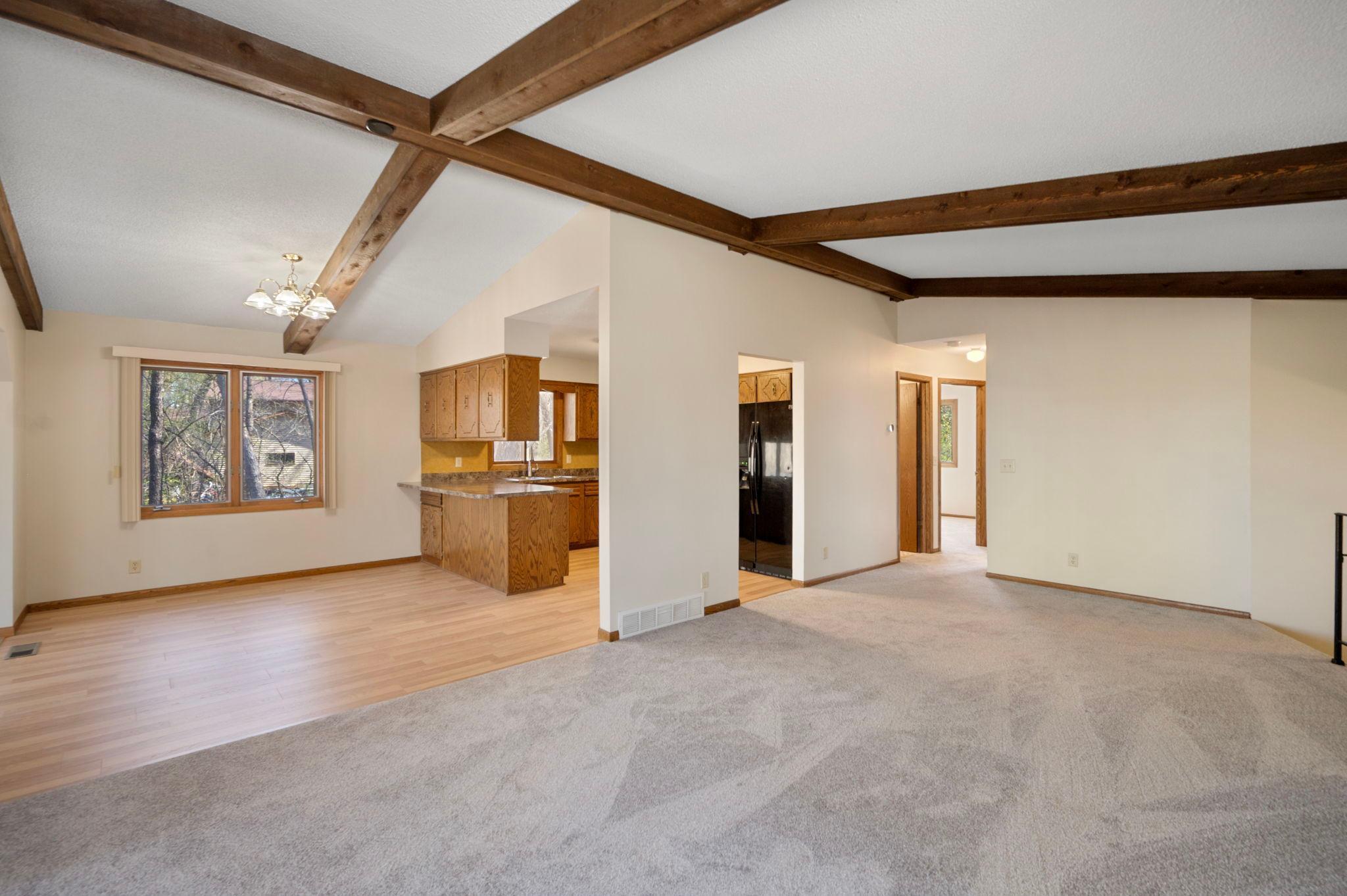 Living room and informal dining area upper level