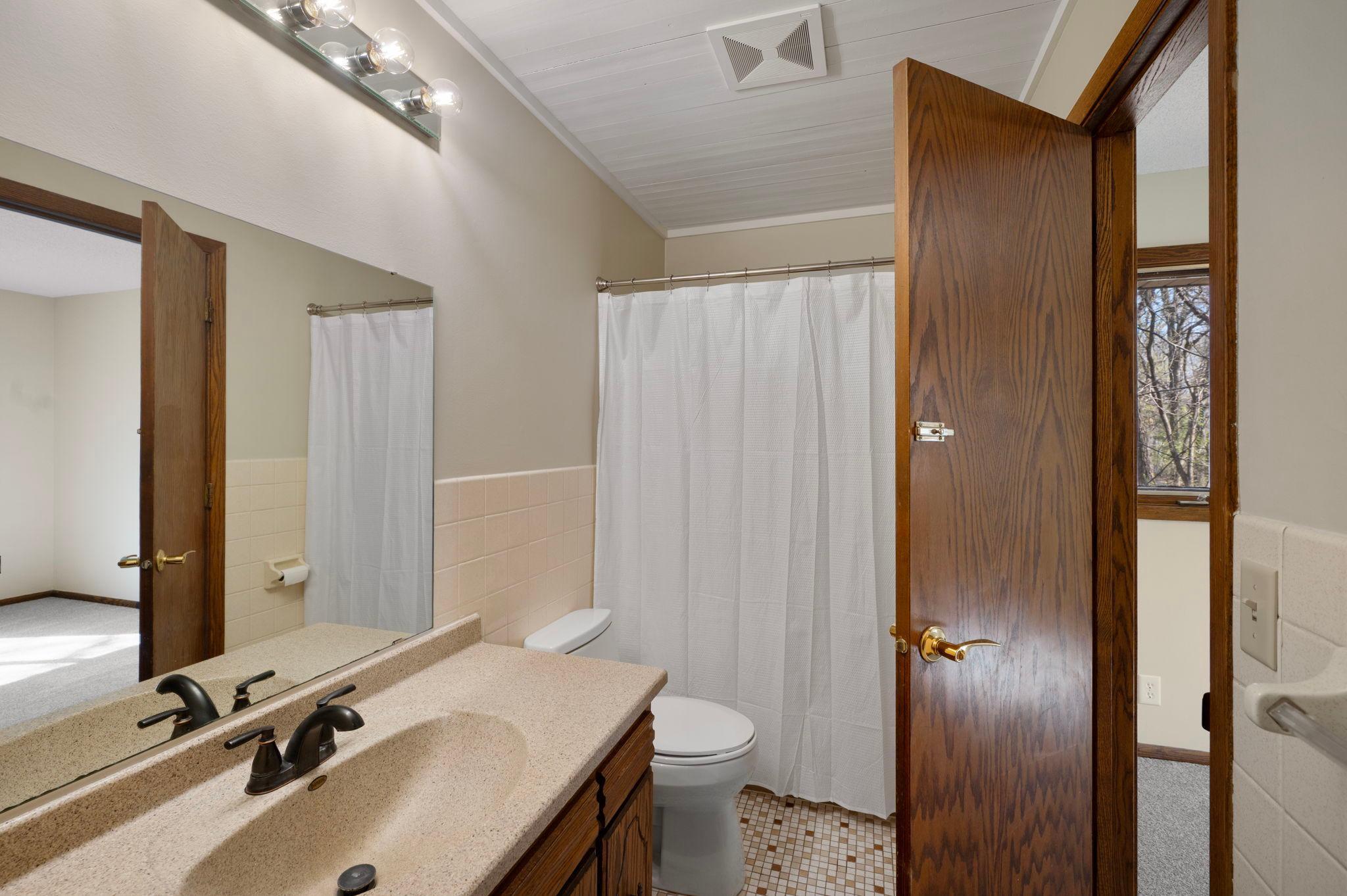 upper level full bath, walk through bath, ceramic flooring