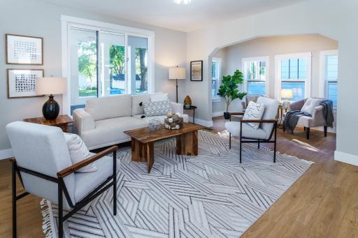 Sun-filled Living Room and adjacent Sunroom