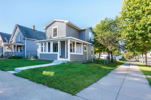 3125 Upton Ave North. All new exterior, newly built Porch and second story as well as concrete walkway.
