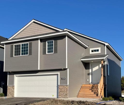 3216 Kady Ave NE- Completed New Construction will be ready for move-in 10/16/2025! Final touch up work will be done soon. Highlights include a Finished Walkout Lower Level. Front door will be painted and sod installed soon.