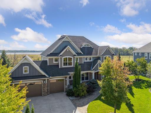 22 Leaf Wing Drive sits in front of an absolutely gorgeous background in Rapp Farm.