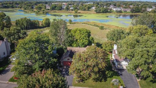 On Sunset Pond! This 4BR WALKOUT rambler is located just steps from Sunset Pond and the walking trails that surround it!