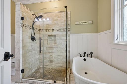 Spa-like bathroom retreat with heated floors and nice tile work.