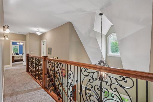Another angle of the upper-level hallway.