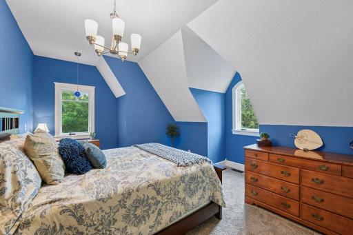 This is the 3rd bedroom on upper level that serves as a great guest room with 3/4 bathroom attached.