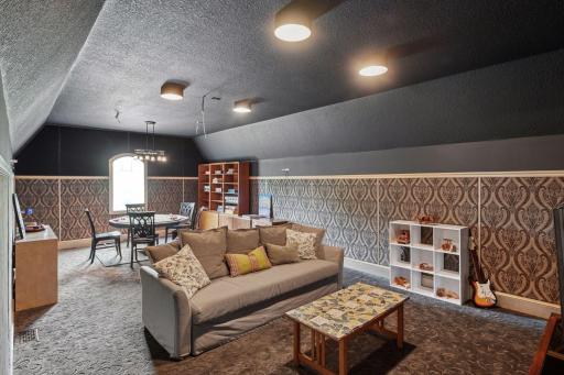 Upper level media/theatre room. Being used as family and game space now. All wired up and soundproof to be an epic theatre room if desired!