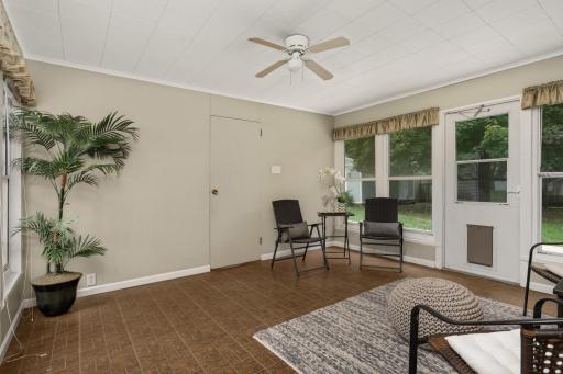 Access the oversized 2 car garage or the huge backyard from the breezeway