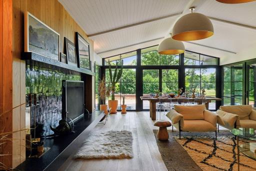 Welcome to 20025 Manor Road, perched on a knoll with nature views from nearly every window and countless spaces to relax or entertain. Minutes away from Excelsior, Cottagewood and quick access to the LRT trail. Spacecrafting - 0007.jpg