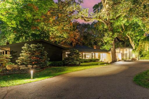 Sprawling Mid-Century on 2 acres of privacy surrounded by nature. Twilight photos at end of photo tour capture the setting in dramatic evening light. 20025 Manor Road - Spacecrafting - 0002.jpg