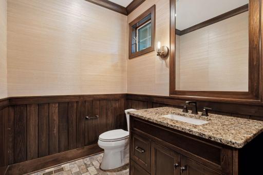 This main level powder room is all about the details.