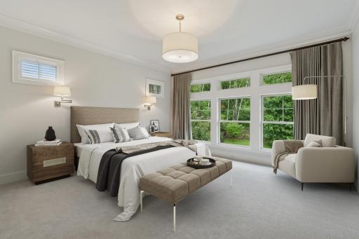 Designed for rest and relaxation, this main level primary bedroom is both peaceful and beautifully appointed.