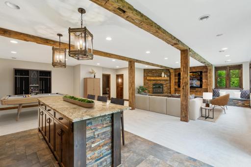 The lower level is an entertainerâs dream. Whether pouring cocktails or serving appetizers, this space makes entertaining easy.