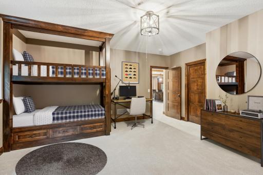 This lower level bedroom with built-in bunk beds is perfect for sleepovers, guests, or weekend visitors.