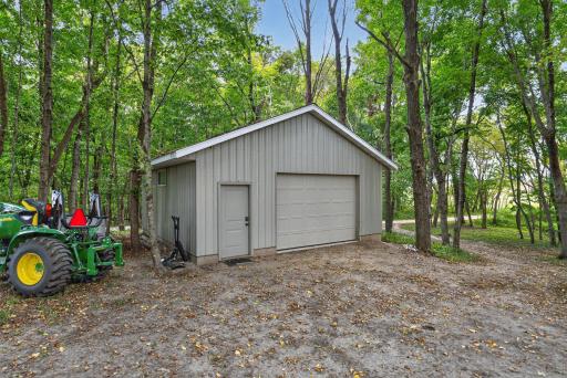 An additional 24-by-24 detached garage offers even more parking or storage options.