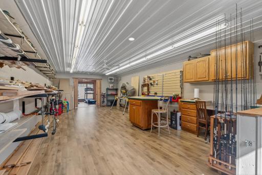 Upstairs, a second floor provides two versatile spaces for woodworking, exercise, hobbies, bunk room, home office, or storage.