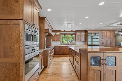The chefâs kitchen is generous in both size and function, designed with an expansive center island with breakfast bar seating.