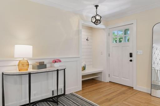 Lovely millwork and new lighting create an immediate sense of style and character