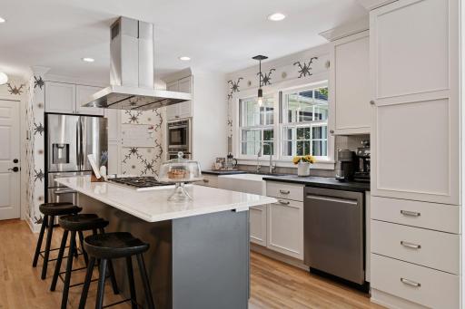 The gourmet kitchen offers large center island and top of the line appliances