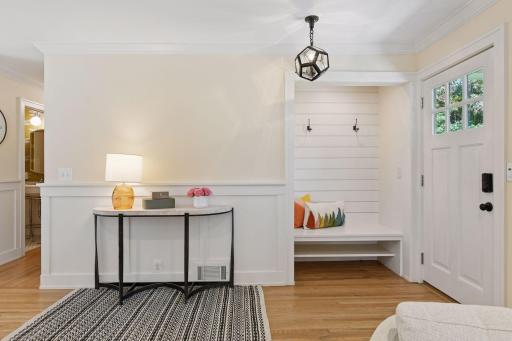 Shiplap entry way adds touches of East Coast inspired charm and detailing