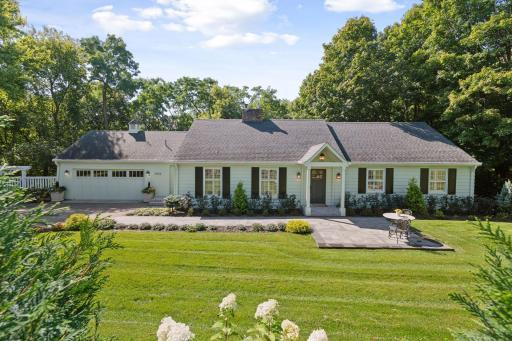 Welcome to 3922 Heathcote - a charming Cape Cod located in the heart of Deephaven
