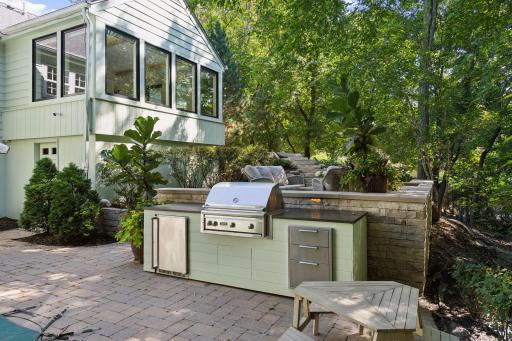 Newly built in grill area with fridge and granite top