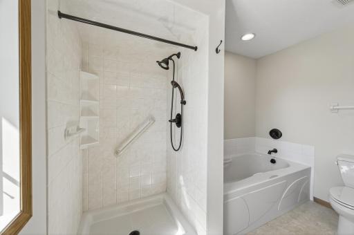 Primary en-suite with soaking tub and walk in shower