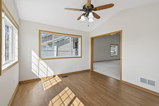 View of light and airy sunroom perfect for enjoying all season!