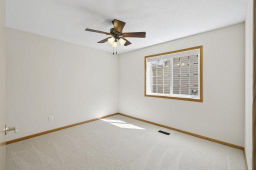Second bedroom, with ceiling fan and large window!