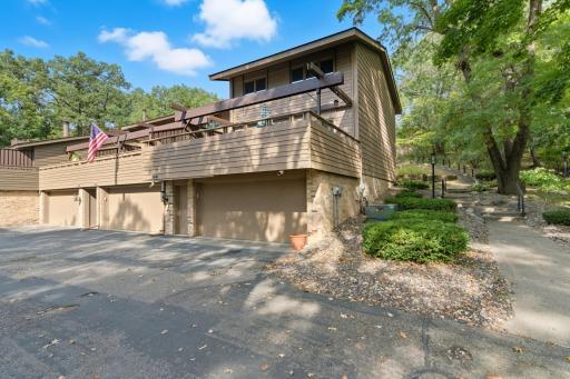 Photo for 122 Birnamwood Drive, Burnsville, MN 55337 - listing #6793456 The amazing gardens around the home and neighborhood make this end-unit stand out as a top pick!