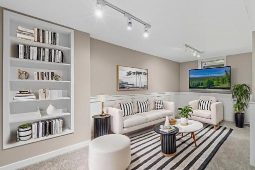 Virtually staged, lower level family room is another great space in your new home.