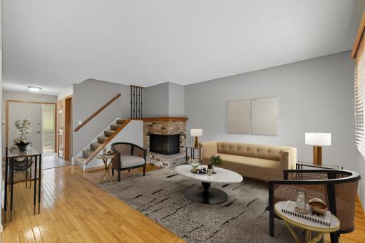 Virtually staged, Enjoy those cool days and evenings in your main level living room by your wood burning fireplace.