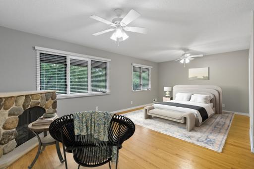 Virtually staged, Primary Bedroom with large windows that allow for lots of light to fill your bedroom.