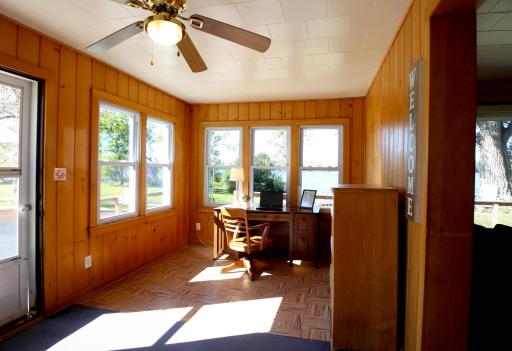 Front porch with many windows for great light and a view of the lake